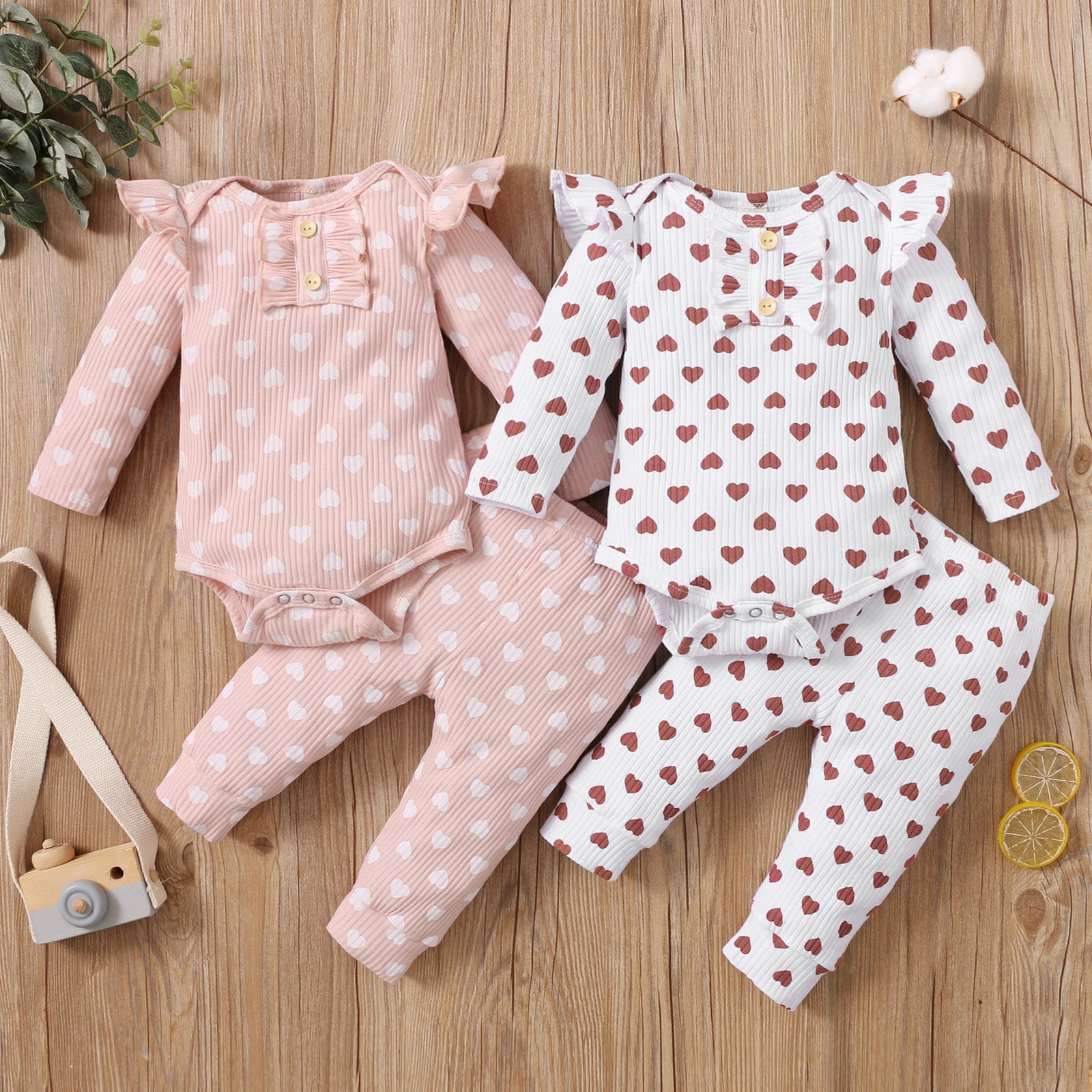 2pcs Cotton All Over Love Heart Print Baby Long-sleeve Ribbed Romper and Pants Set