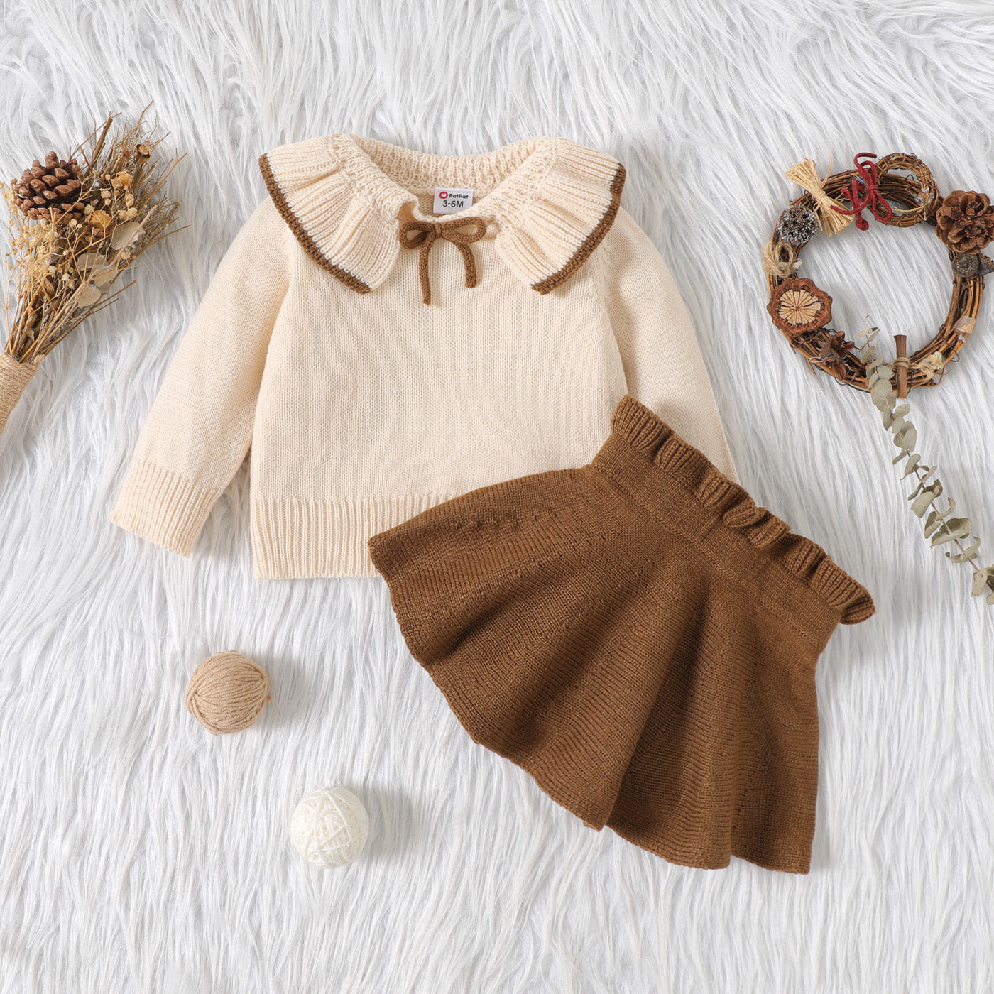 2pcs Baby Girl Solid Knitted Ruffle Trim Long-sleeve Top and Skirt Set